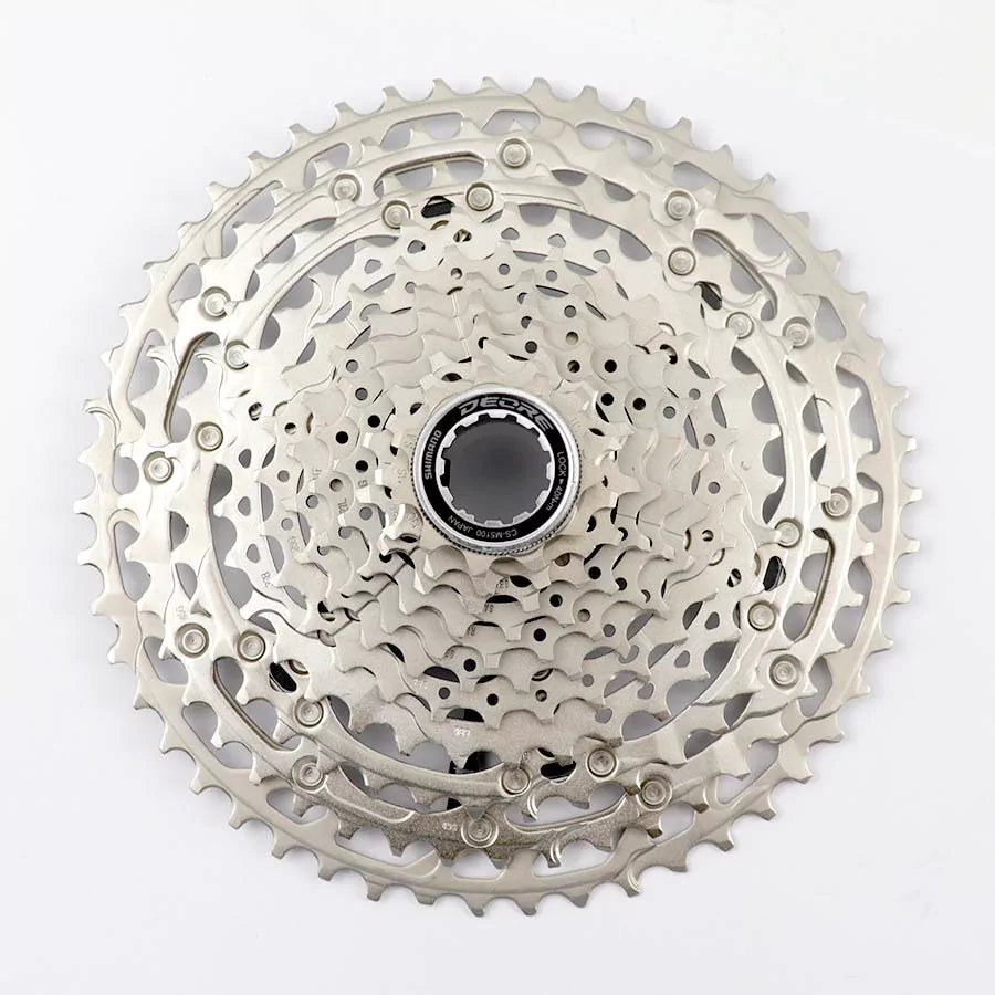 Cassete Shimano Deore CS-M5100 11 velocidades disponível nas relações 11-42T e 11-51T para bicicletas Mountain Bike com transmissão Shimano.